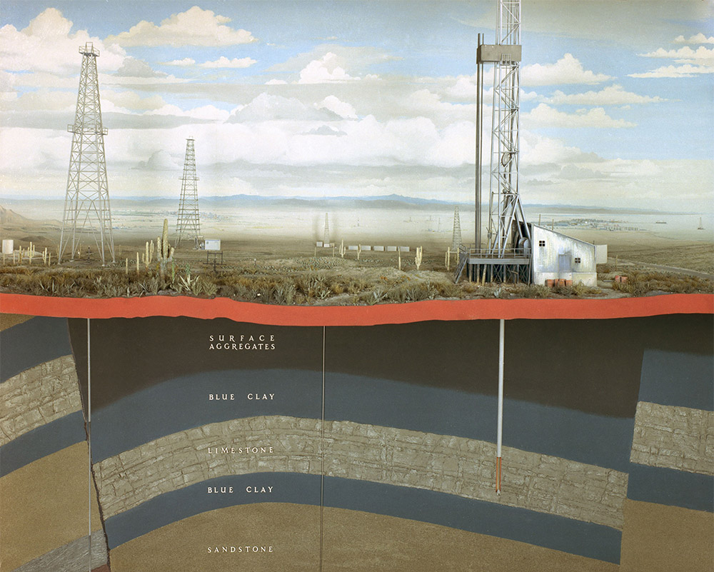 Typical oil-field in the Gulf of Mexico. A diorama 3D model showing drilling rig and a finished well. In front of a diagram showing an oil-field's typical geological structure stands a full-size bit used for drilling wells.